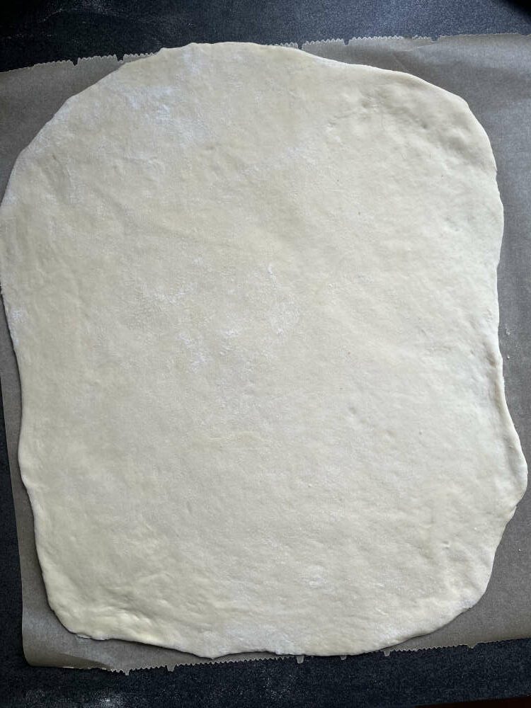 Der ausgerollte Teig